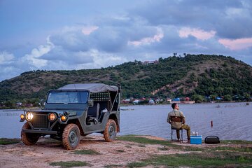 Countryside and sunset with Military Jeep