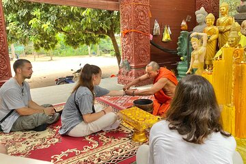 Buddhist Monastery with Monks Water Blessing