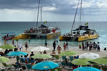 Negril 7 mile Beach, Party Catamaran Cruise , Snorkeling and Ricks Cafe Combo