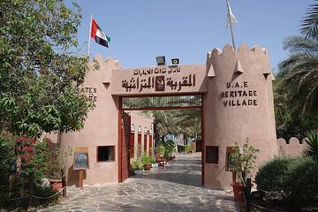 Abu Dhabi and Heritage Village from Dubai 