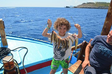 Fishing Boat Trip with Fish Meal and Swim Stops