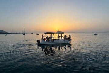 Discovering Cefalù's Coastline Activity on a Mini Catamaran