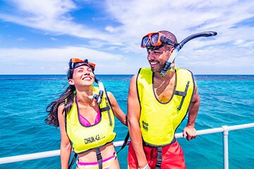 Party Catamaran Cruise, Snorkel, ATV, and Ziplines 