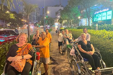 Private Street Food Discovery by Cyclo at Night in Ho Chi Minh