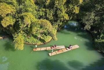 Bamboo Rafting at Martha Brae River & Lunch At Scotcheis 