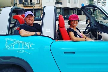 Ride through romantic Foz in an eco-friendly car