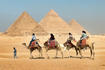 Half day visiting Gizah pyramids , Sphinx and Camel ride