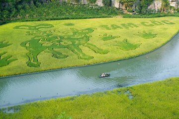 Ninh Binh Highlights: Biking, Swimming, Sunset Party from Hanoi