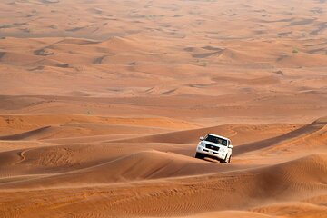 Dubai Desert Safari with Quad Bike, Camel Ride, Dinner and Shows