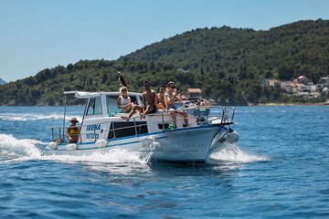 Visit 2 Islands of Zadar on a traditional wooden boat during half-day trip