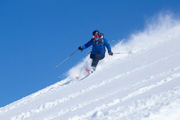Ski experience in Colorado with round transportation and guide