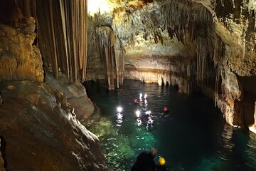 Caving: Hike-rappel-snorkel and cave exploration - all levels