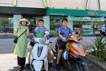 Saigon Morning City Historical Scooter Tour w Ao Dai Rider option