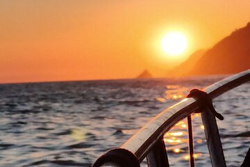 Aperitif on a boat at sunset, Porto Venere and islands