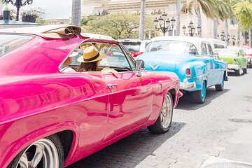  Private Classic Car tour with food at a beach restaurant.