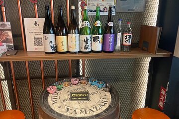 Casual Japanese SAKE tasting and snack experience in Kabukicho