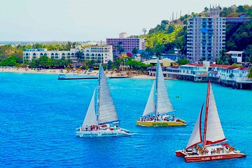 Bamboo Rafting and Party Catamaran Open Bar Cruise in Montego Bay