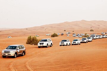 Private Desert Safari With BBQ Dinner,sand surf &Camel Ride Dubai