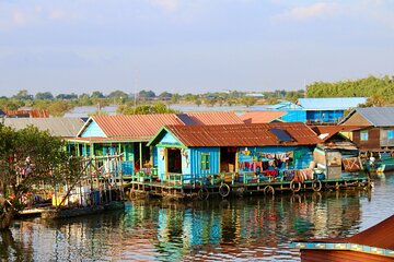 Premium Sunset Floating Village Tour with 4-course Khmer Dinner