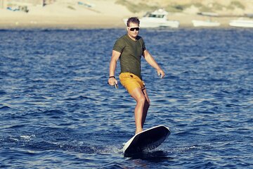 Thrilling E-Foil surfing above the waves of Muscat