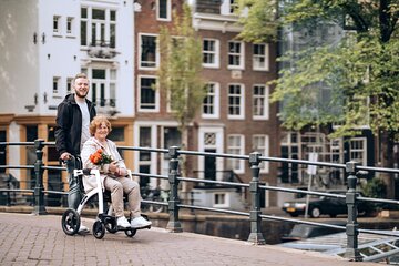 Professional Photoshoot at Damrak: Amsterdam’s Iconic Waterfront