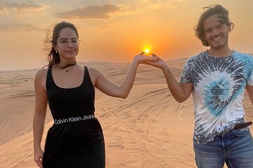 Dubai Desert Safari with Camel Ride and Sandboard