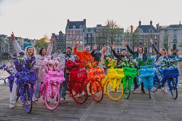 Explore Amsterdam canals on iconic Flower Bikes