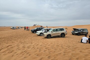 Dubai Morning Desert Safari Camel ride and Sandboarding