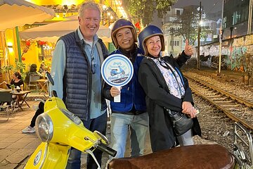 Hanoi After Dark Private Vespa Tour: Street Foods & Night Vibes 
