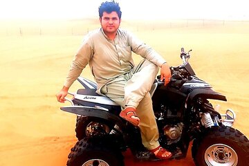 60 Min Quad Biking Tour In Dubai With Camel Ride & Sand Boarding 