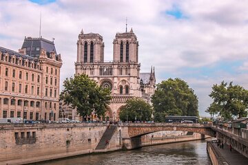 Eiffel Tower Stairs, Seine Cruise & Notre Dame + Louvre Option