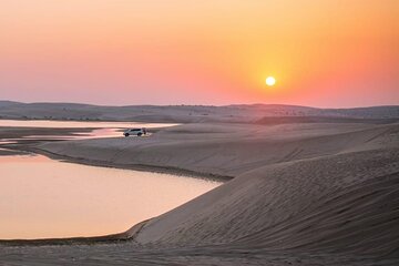 Sunset & sunrise Desert Safari with Sandboarding and Camel Ride