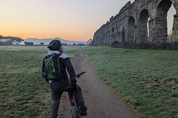 Chase the sunrise cycling on the Appia Antica