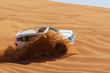 Premium Evening Desert Safari, Quad Bike, Camel & VIP BBQ Dinner 