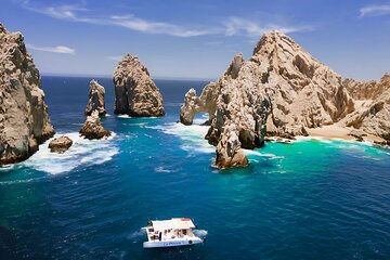Cabo Catamaran Tour: Snorkeling & Unlimited Drinks Included
