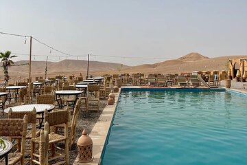 Agafay Day: Quad, Dromedary, Swimming pool, Moroccan Dinner & Show 