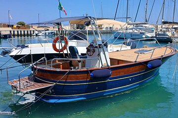 Gozzo boat tour in the caves with aperitif in Polignano a Mare