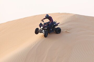 Explore Dubai Desert by Private Quad Bike Tour with pick and drop